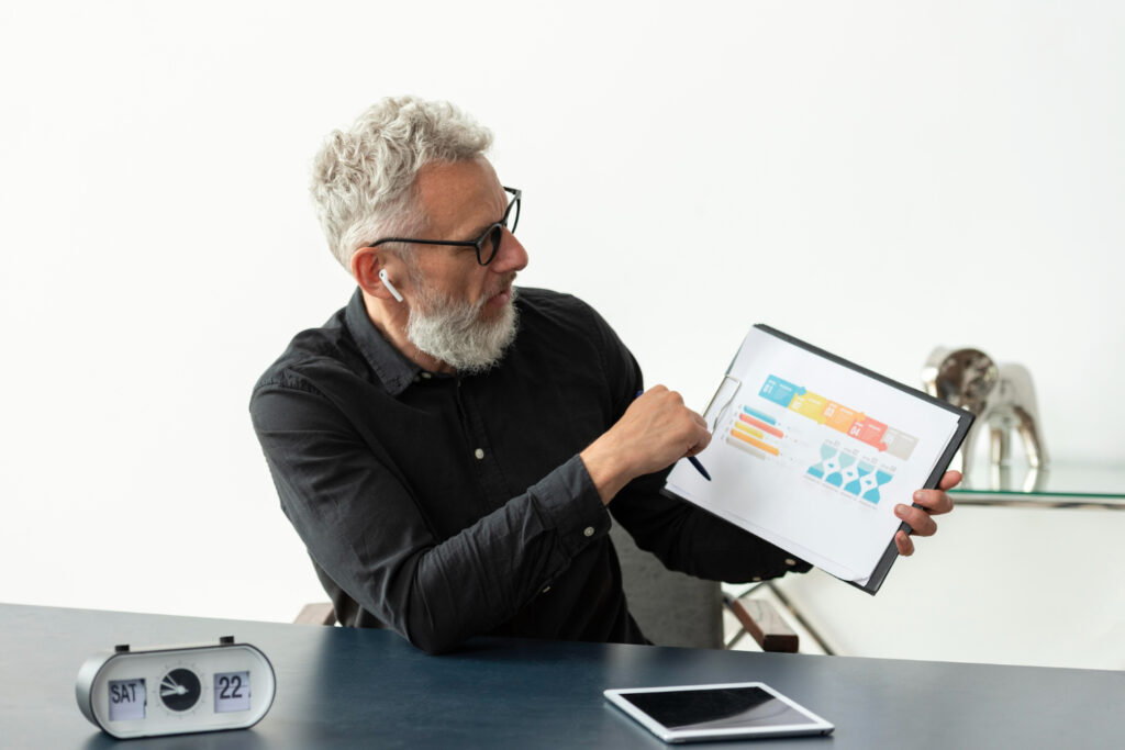 A digital marketing dashboard displayed on a clipboard. 